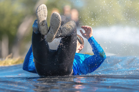 STOCKHOLM, SWEDEN - AUG 27, 2016: Giant hill slide at the Tough Viking event at Gardet in Stockholm.のeditorial素材