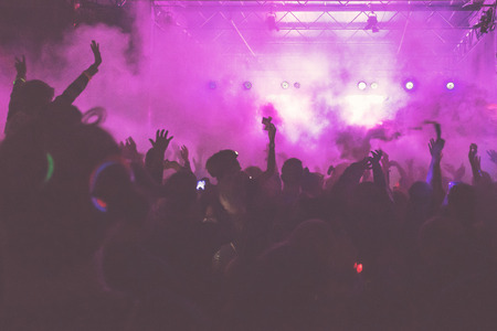 STOCKHOLM, SWEDEN - SEPT 18, 2016: Bright colorful stage with crowd in front at the Color Run Night Edition in Stockholm.のeditorial素材