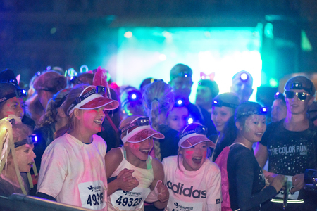 STOCKHOLM, SWEDEN - SEPT 18, 2016: Colorful happy group on the start line at the Color Run Night...