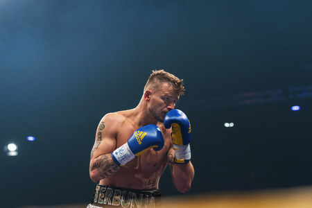STOCKHOLM, SWEDEN - SEPT 10, 2016: Match between Naim Terbunja (SWE) vs Baptiste Castenegro (FRA) in super middleweight at The winner takes it all event in boxing. Winner Terbunjaのeditorial素材