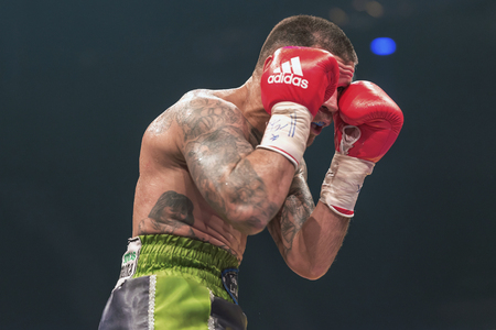STOCKHOLM, SWEDEN - SEPT 10, 2016: Match between Anthony Yigit (SWE) vs Armando Robles (MEX) in super lightweight at The winner takes it all event in boxing. Winner Anthony Yigitのeditorial素材