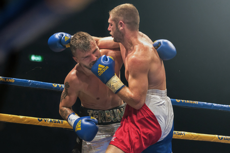 STOCKHOLM, SWEDEN - SEPT 10, 2016: Match between Naim Terbunja (SWE) vs Baptiste Castenegro (FRA) in super middleweight at The winner takes it all event in boxing. Winner Terbunjaのeditorial素材