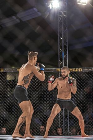 STOCKHOLM - OCT 8, 2016: Fight between Arman Popal vs Aleksi Putkonen at Superior Challenge 14 at Eriksdalshallen in Stockholm.のeditorial素材