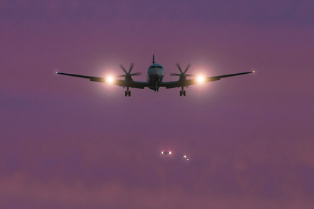 ARLANDA, SWEDEN - SEPT 6, 2016: Front view of a passenger aircraft with a que of other planes at...