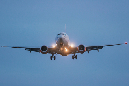 ARLANDA, SWEDEN - SEPT 6, 2016: Passenger aircraft in for landing at Arlanda Airport (ARN)の写真素材
