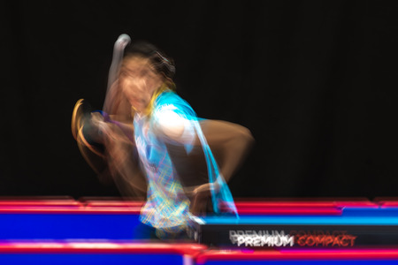 STOCKHOLM, SWEDEN - NOV 19, 2016: Sakura Mori (JPN) vs Jihee Jeon (KOR) in the table tennis tournament SOC in motionblur.のeditorial素材