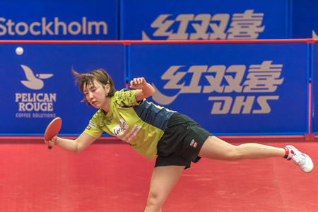 STOCKHOLM, SWEDEN - NOV 19, 2016: I Ching Cheng (TPE) vs Hyowon Suh (KOR) in the table tennis tournament SOC at the arena Eriksdalshallen in Stockholm.のeditorial素材