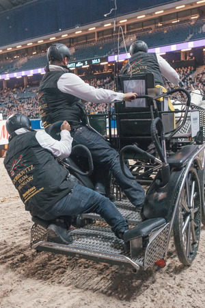 SOLNA, SWEDEN - NOV 27, 2016: Jozsef Dobrovitz at the FEI World Cup Driving final in the Sweden International Horse Show at Friends arena.のeditorial素材