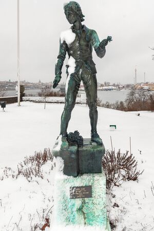 STOCKHOLM, SWEDEN, FEB 22, 2017: Sculpture in bronze of the young Carl von Linne by Carl Eldh at Prince Eugens Waldermarsudde during snowy weather.のeditorial素材