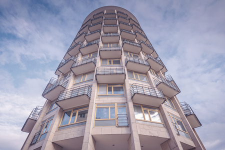 STOCKHOLM, SWEDEN, FEB 10, 2017: Exterior facade of newly built tower residentential area in Ostermalm with blue sky, Stockholmのeditorial素材