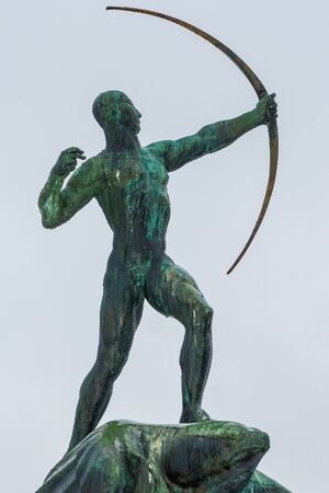 STOCKHOLM, SWEDEN, FEB 22, 2017: Sculpture in bronze of the archer by Carl Milles at Prince Eugens Waldermarsudde during snowy weather.のeditorial素材
