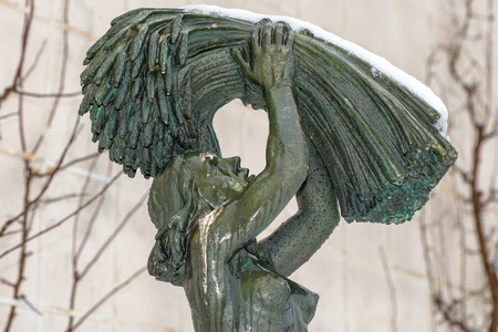 STOCKHOLM, SWEDEN, FEB 22, 2017: Sculpture in bronze of the Harvest by Ivar Johnsson at Prince Eugens Waldermarsudde during snowy weather.のeditorial素材