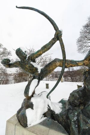 STOCKHOLM, SWEDEN, FEB 22, 2017: Sculpture in bronze of Herakles by Antoine Bourdelle at Prince Eugens Waldermarsudde during snowy weather.のeditorial素材