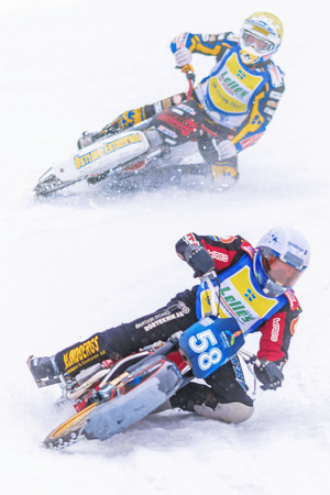 NORRTALJE, SWEDEN, FEB 26, 2017: Iceracing Racers in a curve during the Swedish national championships at HZ Bygg Arena in Hallstavik.のeditorial素材