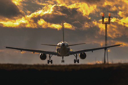 ARLANDA, SWEDEN - MARS 15, 2017: Airliner landing at Stockholm Arlanda (ARN) airport during afternoon.のeditorial素材