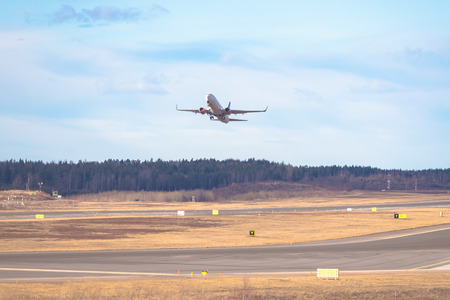 ARLANDA, SWEDEN - MARCH 15, 2017: Airliner departing from Stockholm Arlanda (ARN) airport during daytime.のeditorial素材