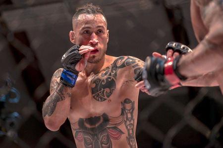 STOCKHOLM, SWEDEN - APRIL 1, 2017: MMA fight between Thomas Hytten vs Fernando Flores at Superior Challenge 15 at Eriksdalshallen in Stockholm. Flores won by decisionのeditorial素材