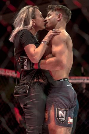 STOCKHOLM, SWEDEN - APRIL 1, 2017: Winner Simon Skold celebrating with Camilla Lackberg at Superior Challenge 15 at Eriksdalshallen in Stockholm. Skold winner in submission against Juntaro Ami.のeditorial素材