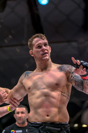 STOCKHOLM, SWEDEN - APRIL 1, 2017: MMA fight between Zvonimir Kralj vs Marthin Hamlet at Superior Challenge 15 at Eriksdalshallen in Stockholm. Winner Hamlet with TKOのeditorial素材
