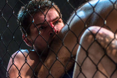 STOCKHOLM, SWEDEN - APRIL 1, 2017: MMA fight between Rostem Akman vs Ole Magnor at Superior Challenge 15 at Eriksdalshallen in Stockholm. Akman wins by TKO.のeditorial素材