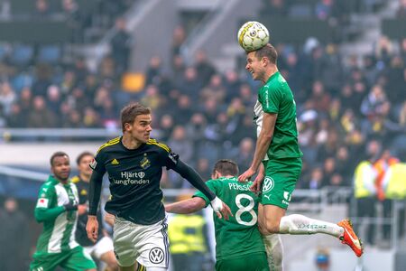 SOLNA, SWEDEN - APRIL 17, 2017: Header at the derby game between AIK and Hammarby IF at the national...