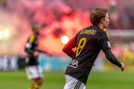 SOLNA, SWEDEN - APRIL 17, 2017: Bengal fire at the derby game between AIK and Hammarby IF at the...