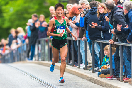 STOCKHOLM, SWEDEN - JUNE 3, 2017: Yuki Kawauchi (JPN) at the Stockholm Marathon. About +13k startedのeditorial素材