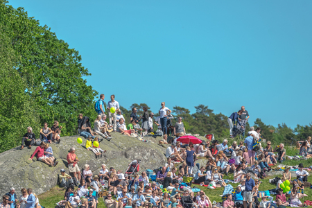 STOCKHOLM, SWEDEN - JUN 6, 2017: Spectators at the Nationaldagsgaloppen at Gardet.のeditorial素材