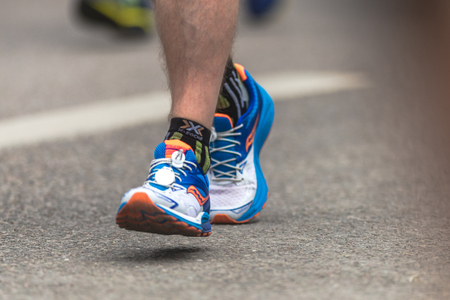 STOCKHOLM, SWEDEN - JUNE 3, 2017: Closeup of legs and feet at the Stockholm Marathon. About +13k startedのeditorial素材