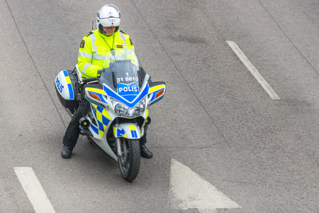 STOCKHOLM, SWEDEN - JUNE 3, 2017: Motorcycle Police at the Stockholm Marathon. About +13k startedのeditorial素材