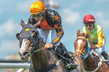 STOCKHOLM, SWEDEN - JUN 6, 2017: Closeup of a jockey on a racehorse in fast pace at Nationaldagsgaloppen at Gardet.のeditorial素材