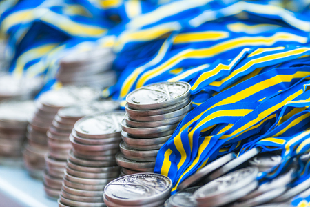 STOCKHOLM, SWEDEN - JUNE 3, 2017: Piles of medals at the Stockholm Marathon. About +13k startedのeditorial素材