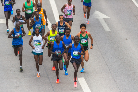 STOCKHOLM, SWEDEN - JUNE 3, 2017: Leading group at the Stockholm Marathon just after the start. About +13k startedのeditorial素材