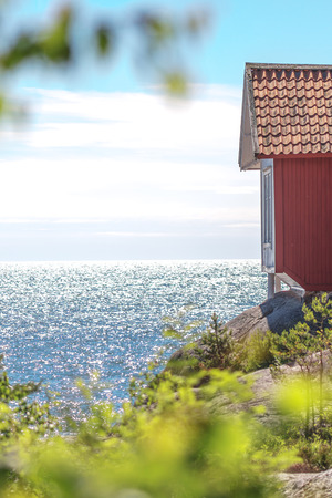 GRISSLEHAMN, SWEDEN, JULY 1, 2017: The writing Albert Engstrom writing cabin at the shore of Grisslehamn.のeditorial素材