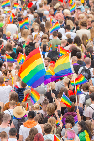 STOCKHOLM SWEDEN, 5 AUG, 2017: The colorful pride parade in Stockholm with happy people and waving flags. Aprox 45 000 participants in the parade.のeditorial素材