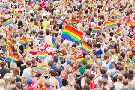 STOCKHOLM SWEDEN, 5 AUG, 2017: Pride parade in Stockholm with happy people and waving flags. Aprox 45 000 participants in the parade.のeditorial素材