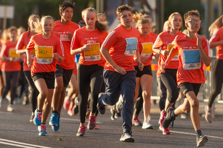 STOCKHOLM, SWEDEN - AUG 19, 2017: Midnight run or Midnattsloppet for kids at the streets of Stockholm. 2 kmのeditorial素材