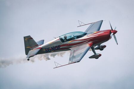 OREBRO, SWEDEN - SEP 2, 2017: Aerobatic show with a Extra 300 in the airshow at Orebro airport. Historic airoplanesのeditorial素材