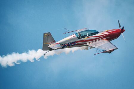 OREBRO, SWEDEN - SEP 2, 2017: Aerobatic show with a Extra 300 in the airshow at Orebro airport. Historic airoplanesのeditorial素材