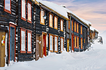 ROROS, NORWAY, DEC 27, 2017: Weathered colorful building facades from the old mining district in Roros.のeditorial素材