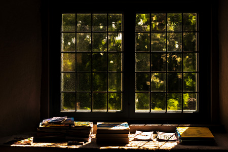 HUSBY SJUHUNDRA, SWEDEN, AUGUST 2, 2018: Windows of the church Husby Sjuhundra church, books to readのeditorial素材