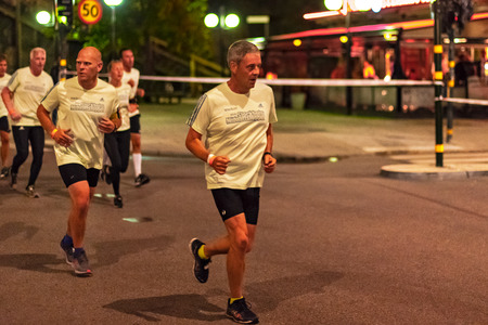 STOCKHOLM, SWEDEN, 18 AUG, 2018: Midnight run at the streets of southern parts of central Stockholm,...