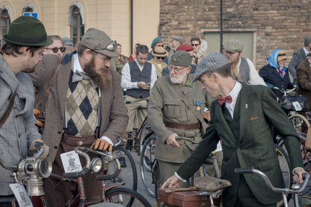 STOCKHOLM, SWEDEN, SEPT 22, 2018: Bike in tweed bicycle tour with vintage bikes and clothes. Before...