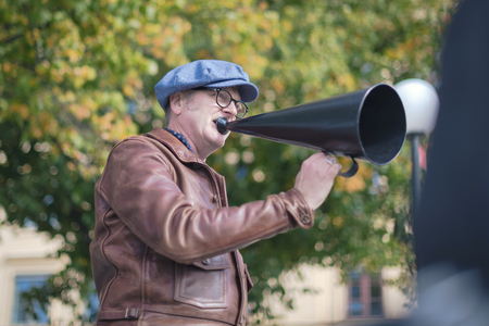 STOCKHOLM, SWEDEN, SEPT 22, 2018: Bike in tweed bicycle tour with vintage bikes and clothes. Before start with backdrop of city hall.のeditorial素材