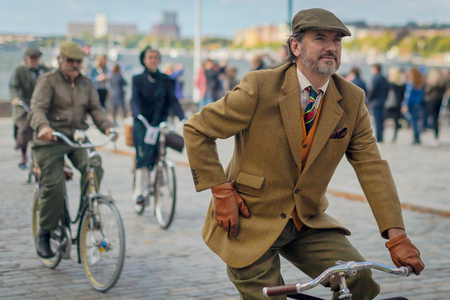 STOCKHOLM, SWEDEN, SEPT 22, 2018: Bike in tweed bicycle tour with vintage bikes and clothes. Before start with backdrop of city hall.のeditorial素材
