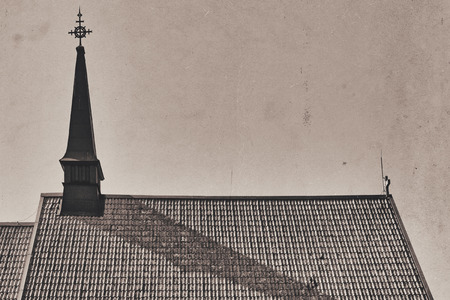 Print of a church tower with a shadow on the church roof, good for halloween with dust and scraches.の写真素材