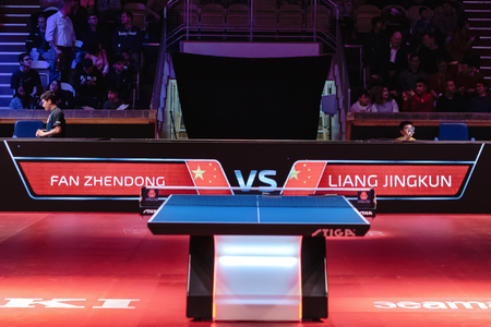 STOCKHOLM, SWEDEN - NOV 3, 2018: Zhendong Fan (CHI) vs Jingkun Liang (CHI) at the table tennis tournament SOC at the arena Eriksdalshallen in Stockholm.のeditorial素材