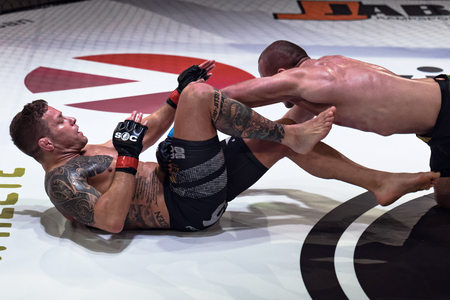 ALVSJO, SWEDEN - DEC 1, 2018: Title bout between David Bielkheden (SWE) vs Marcin Bandel (POL) at the Superior Challenge 18. Bielkeden won18. Bielkeden wonのeditorial素材