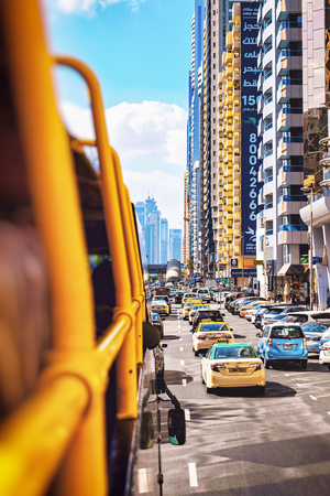 DUBAI, UAE - JAN 20, 2019: View from a seightseeing bus going thru the Dubai traffic during daytime.のeditorial素材