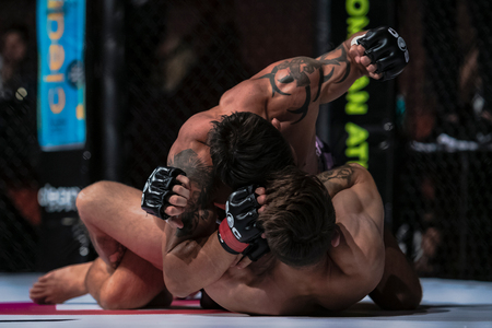 STOCKHOLM, SWEDEN, MAY 11, 2019: Superior challenge 19 title bout between Diego Nunes (BRA) and Simon Skold (SWE). Nunes won by submission.のeditorial素材